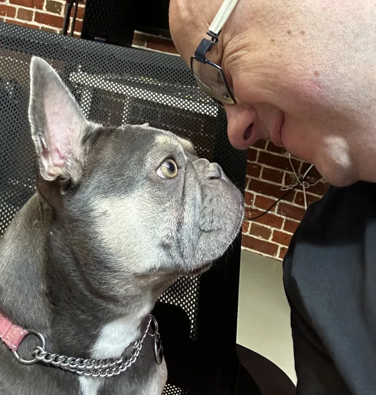 Jonathan nose to nose with Delenn, his French bulldog